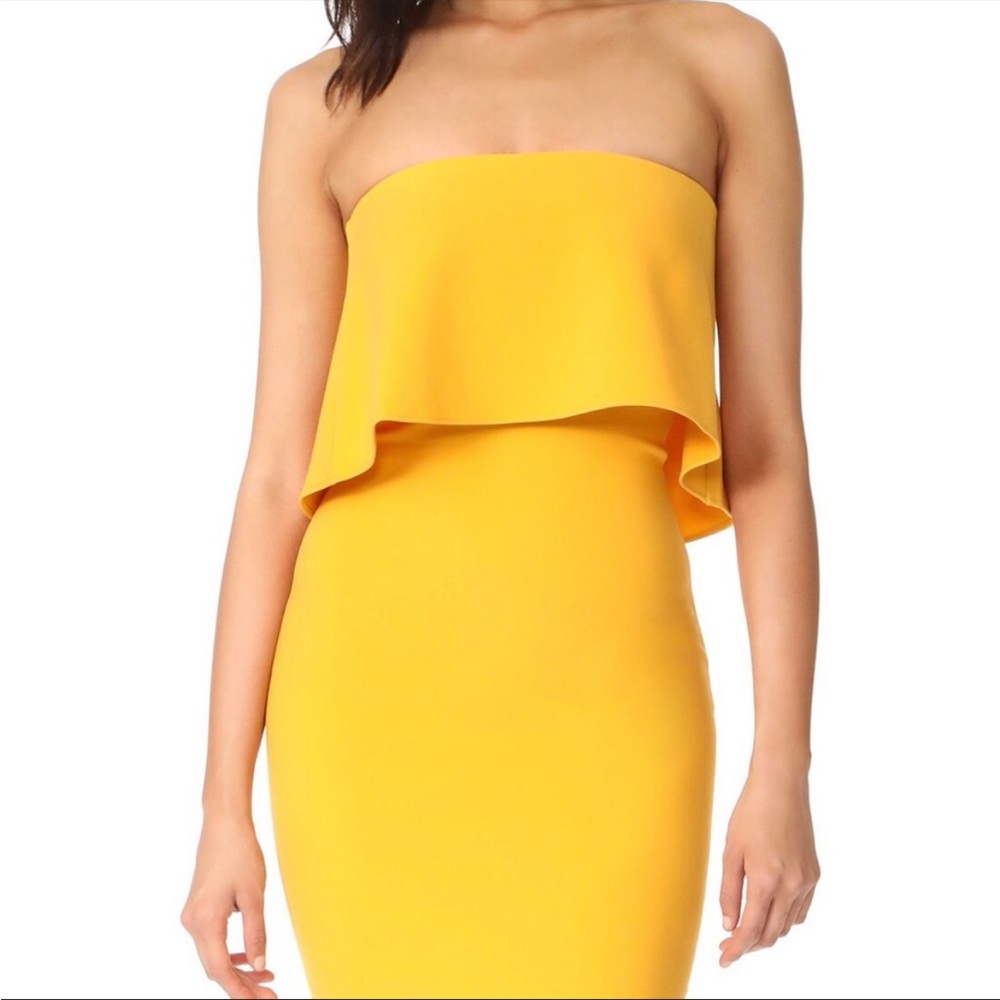 Likely strapless yellow/golden Driggs dress